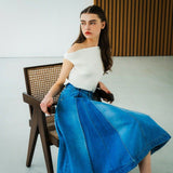 box pleated denim skirt.