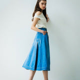 box pleated denim skirt.