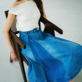 box pleated denim skirt.