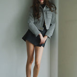 Veste en tweed et cuir